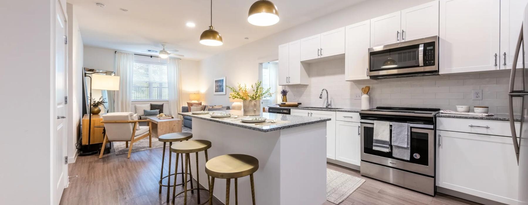 a kitchen with white cabinets