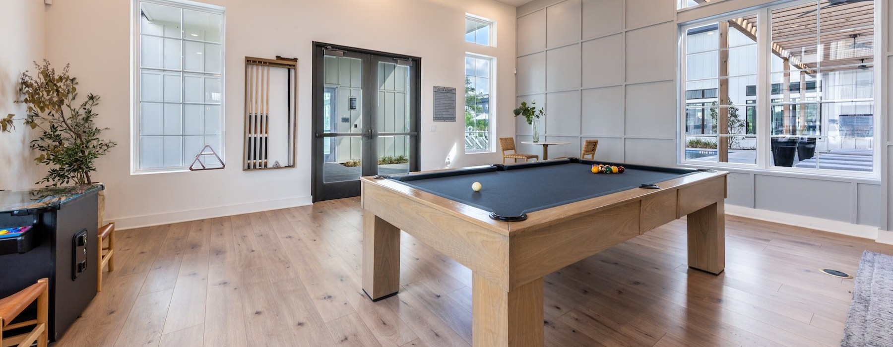a clubroom with a pool table