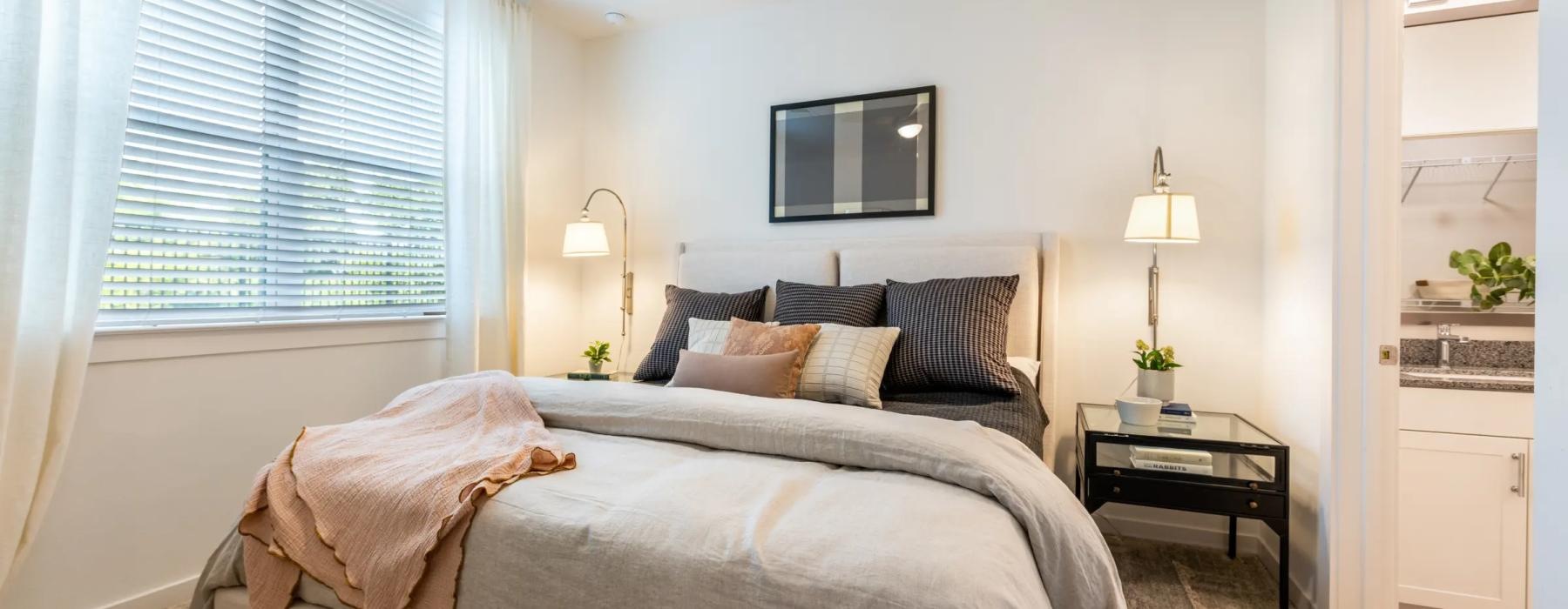 a bedroom with a bed and a tv