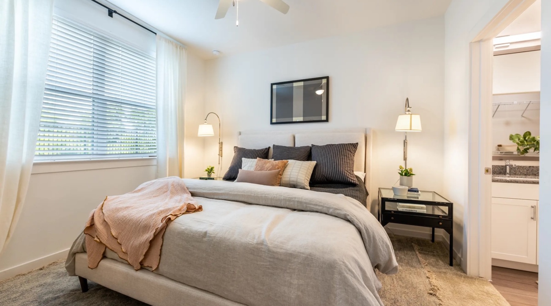 a bedroom with a bed and a tv