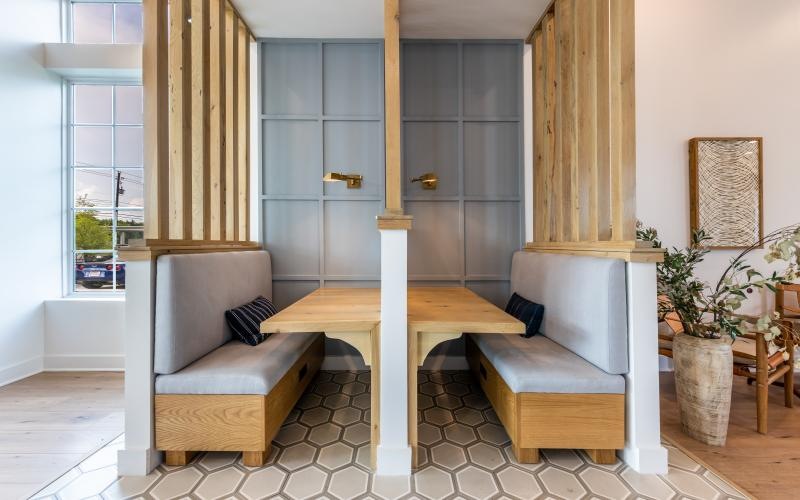 a room with a bench and a table